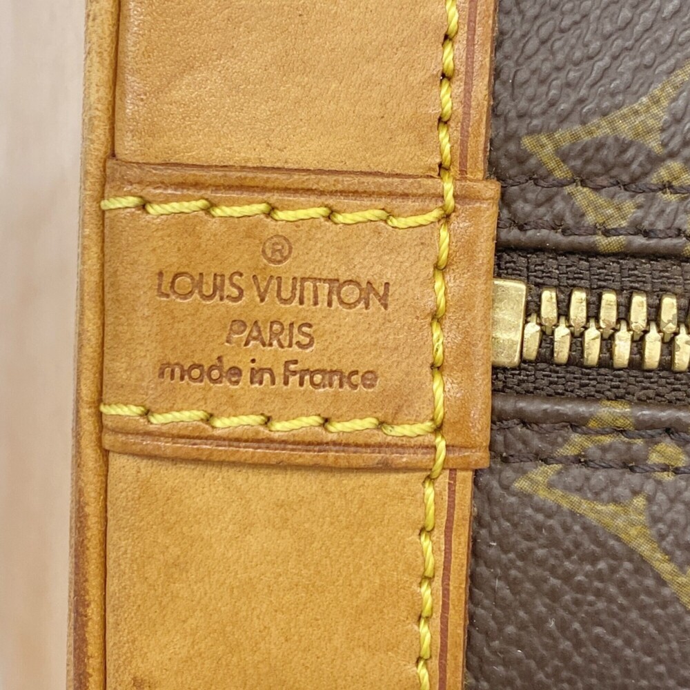 LOUIS VUITTON Brown Monogram Alma Bag - Picture 5 of 11